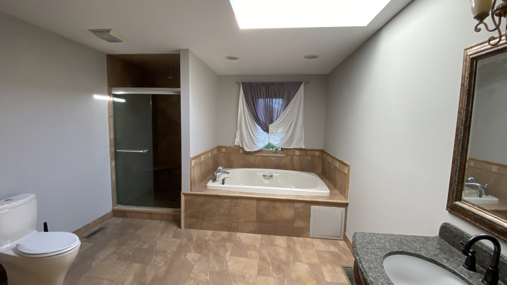 817 Turnbridge Circle Naperville, IL 60540 - Photo 30 of 42 a bathroom with a sink toilet and mirror