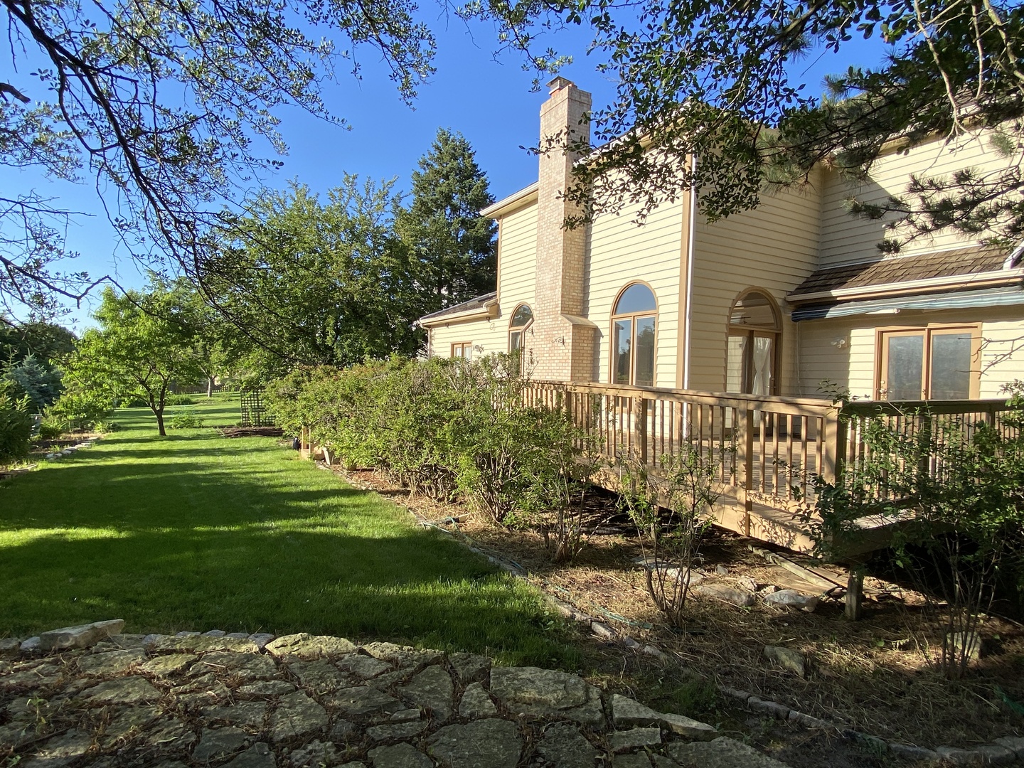 817 Turnbridge Circle Naperville, IL 60540 - Photo 39 of 42 a front view of a house with a yard