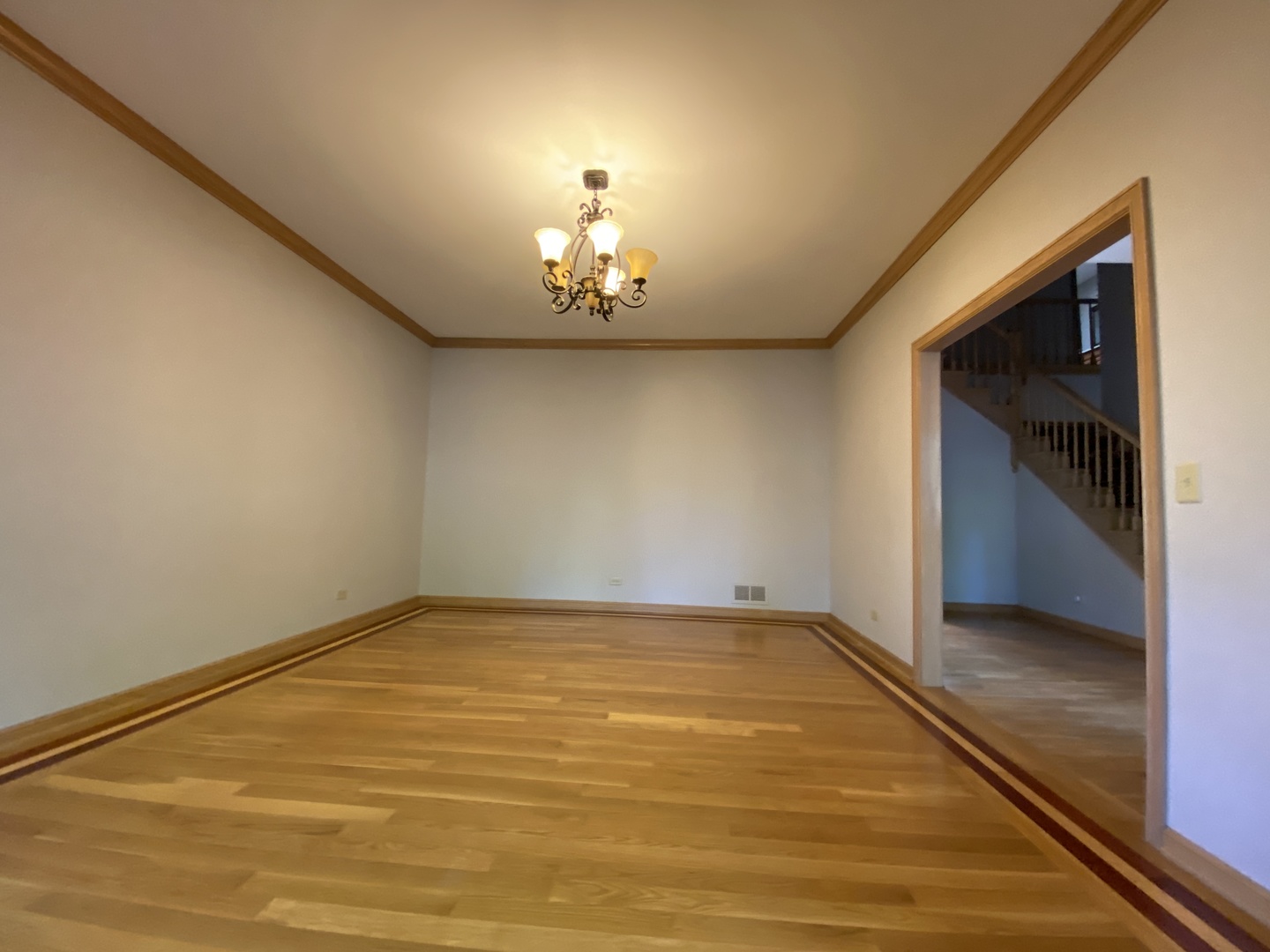 817 Turnbridge Circle Naperville, IL 60540 - Photo 5 of 42 a view of empty room with wooden floor