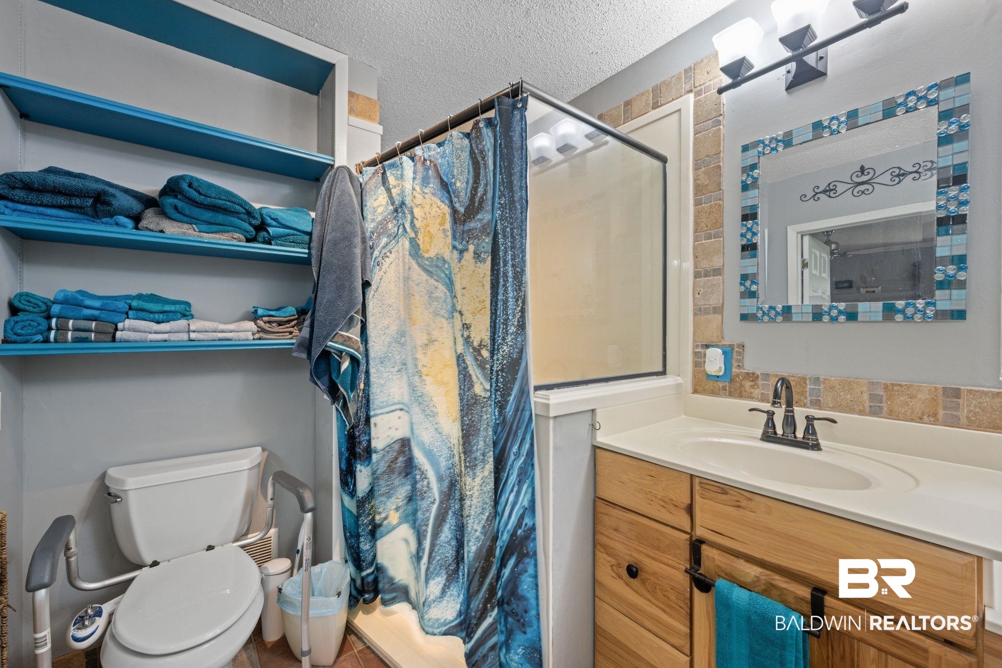40 Caisson Trace Daphne, AL 36527 - Photo 30 of 54 Bathroom featuring toilet, vanity, and a walk-in shower.