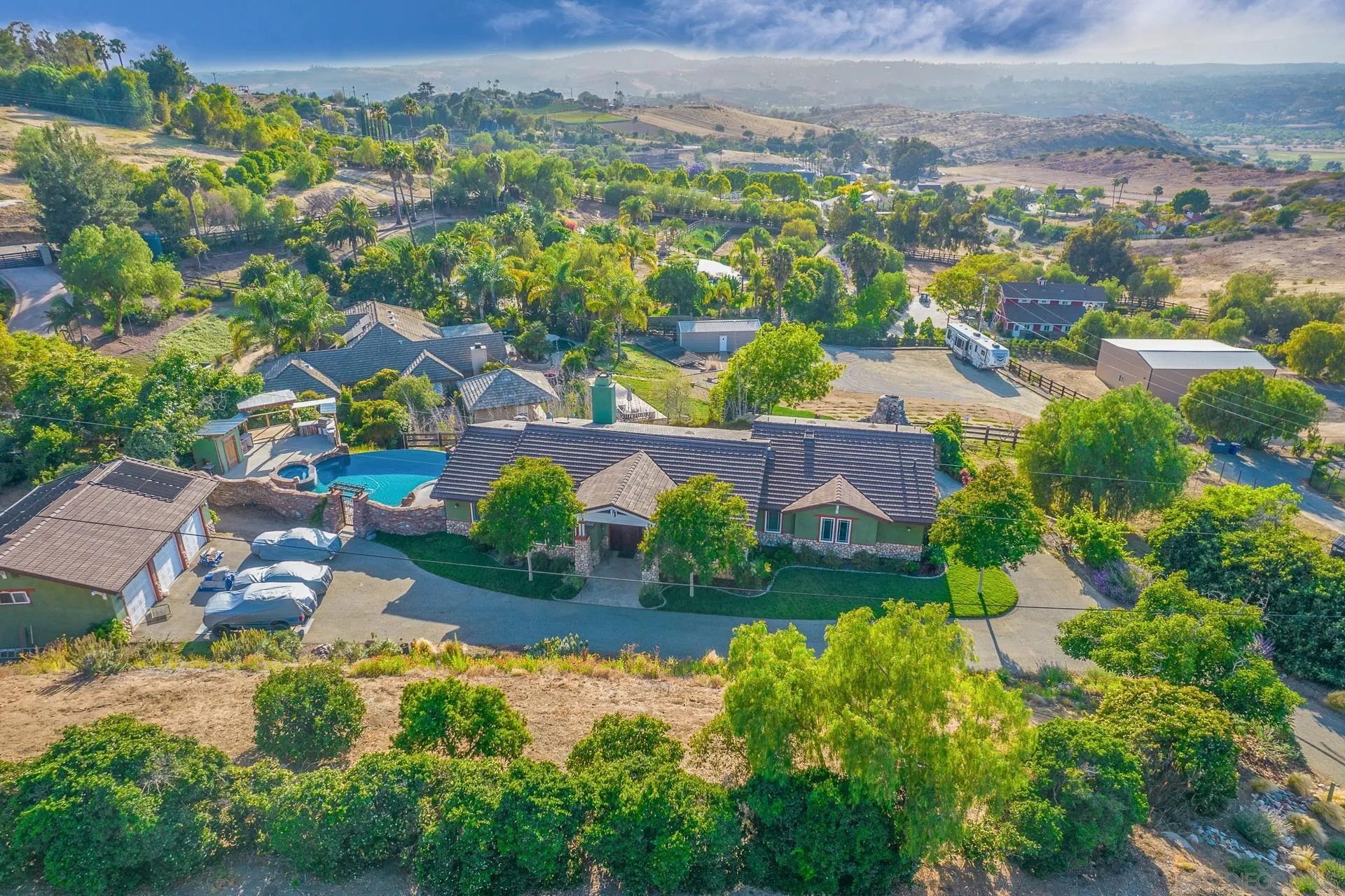 an aerial view of a house with a garden