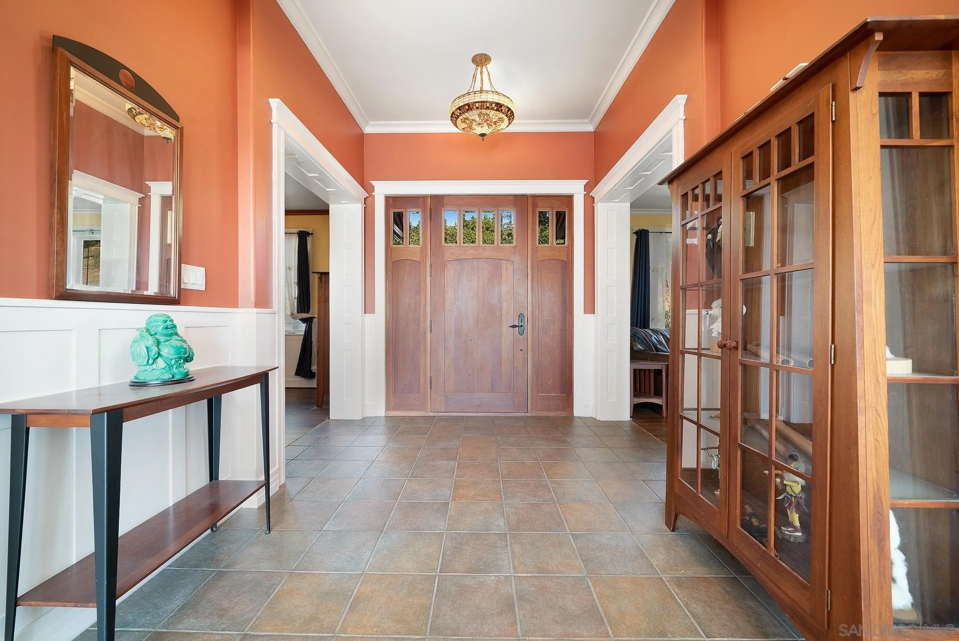 32070 Vía Vera Bonsall, CA 92003 - Photo 16 of 51 a view of an entryway with a chandelier