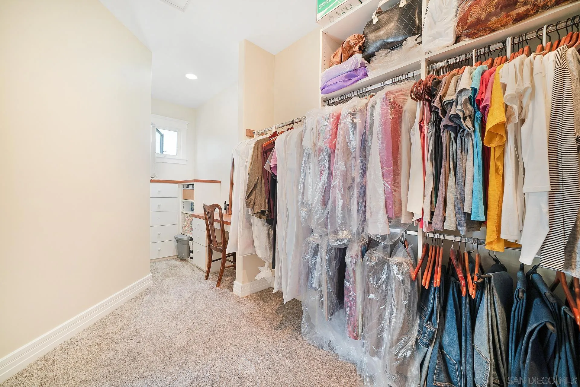 32070 Vía Vera Bonsall, CA 92003 - Photo 24 of 51 a view of walk in closet with clothes