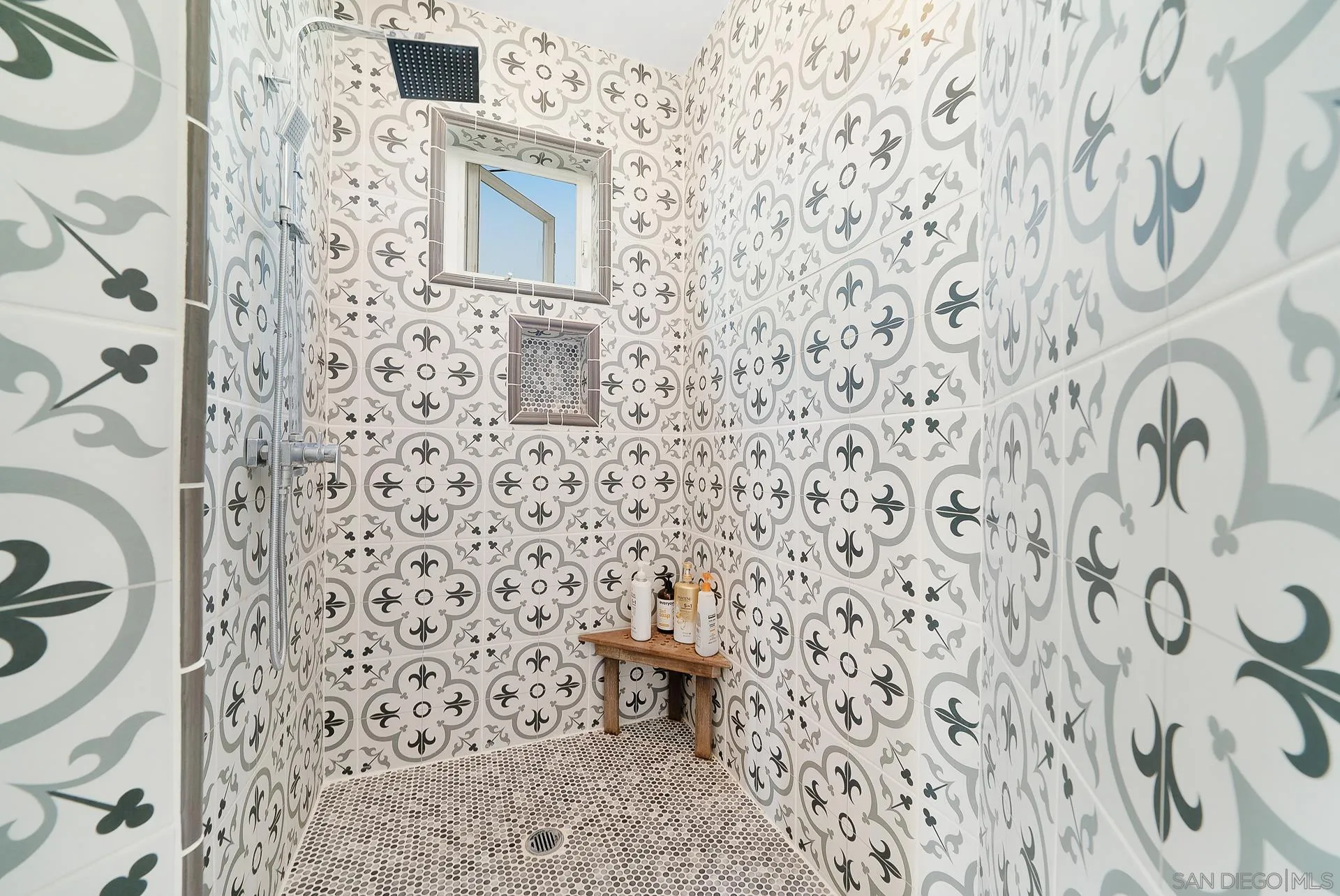 32070 Vía Vera Bonsall, CA 92003 - Photo 28 of 51 a bathroom with a toilet and a shower curtain