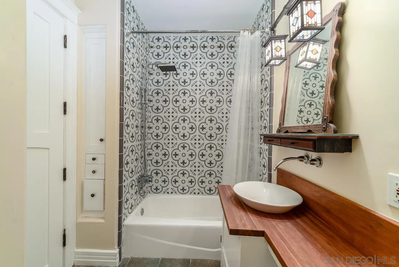 32070 Vía Vera Bonsall, CA 92003 - Photo 34 of 51 a bathroom with a sink a toilet and shower