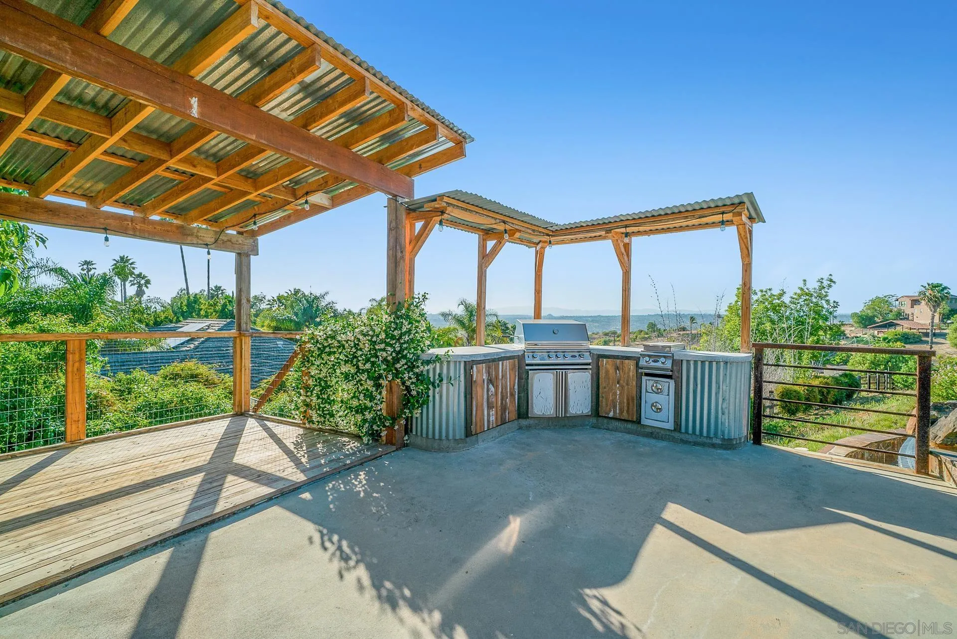 32070 Vía Vera Bonsall, CA 92003 - Photo 42 of 51 a view of a backyard with sitting area