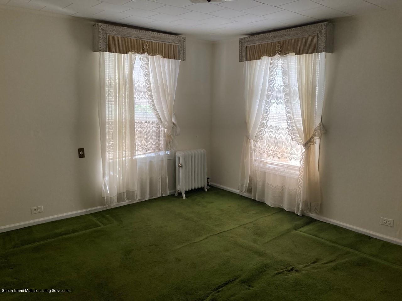 449 Lake Street Brooklyn, NY 11223 - Photo 11 of 14 a view of an empty room and window