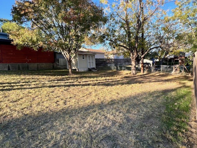 0 Leland Street Kerrville, TX 78028 - Photo 9 of 11 a large tree in front of a house