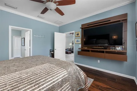 a bathroom with a shower and a glass door