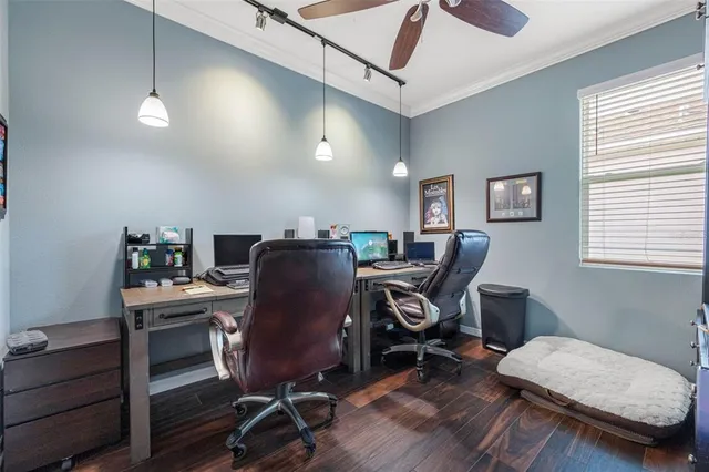 a view of a livingroom with furniture and a flat screen tv