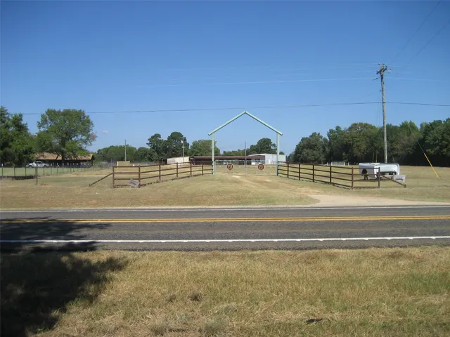 a view of a house with a big yard