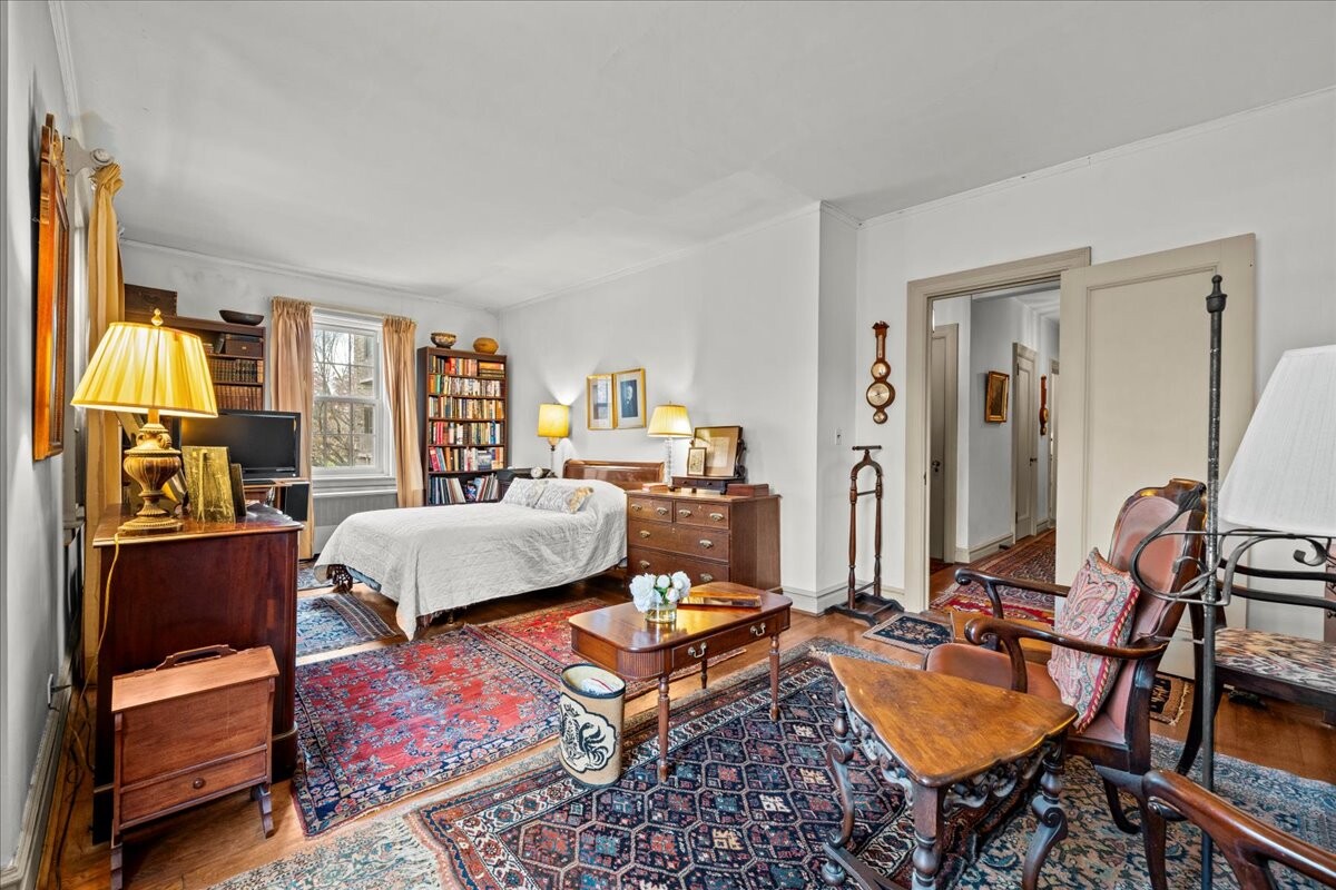 525 West 238th Street, Unit 2B Bronx, NY 10463 - Photo 14 of 31 a living room with furniture a rug and a window