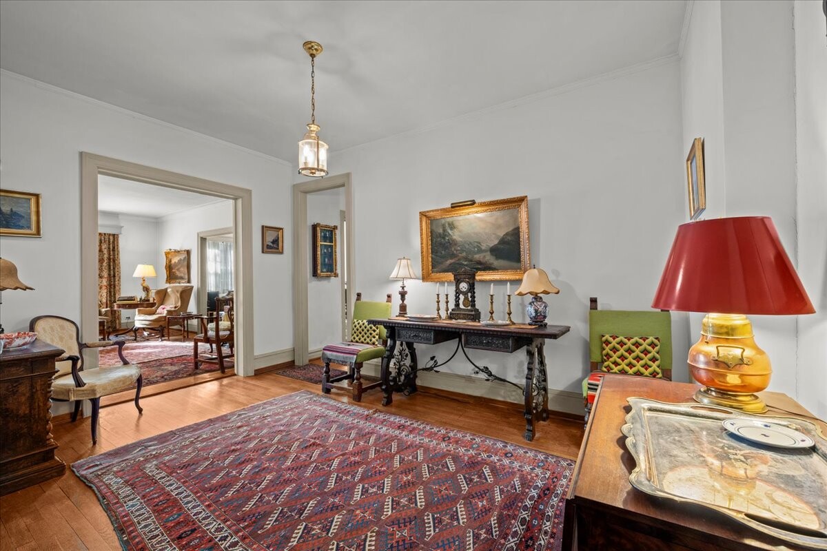 525 West 238th Street, Unit 2B Bronx, NY 10463 - Photo 2 of 31 a living room with furniture a rug and a flat screen tv