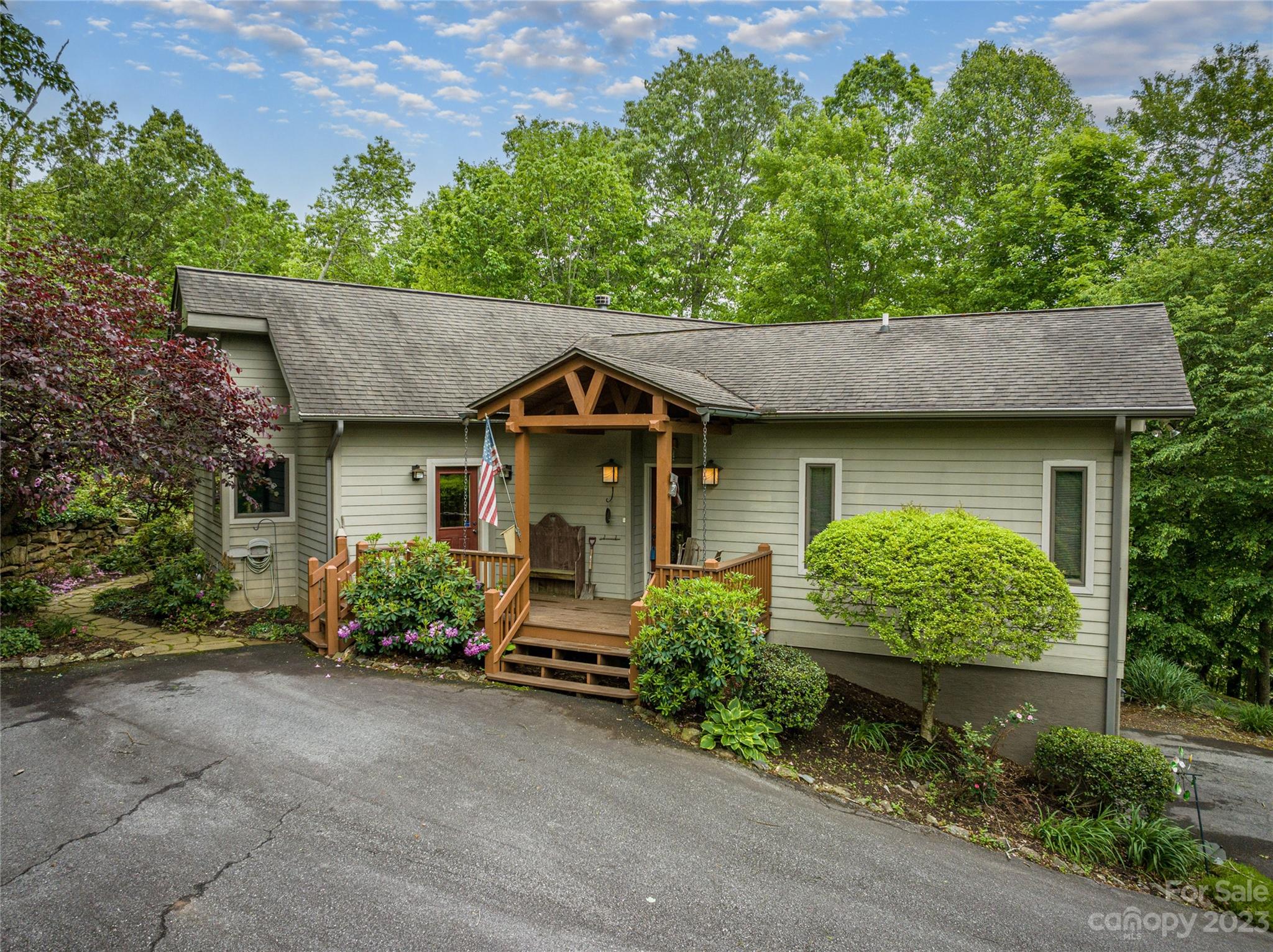 front view of a house with a yard