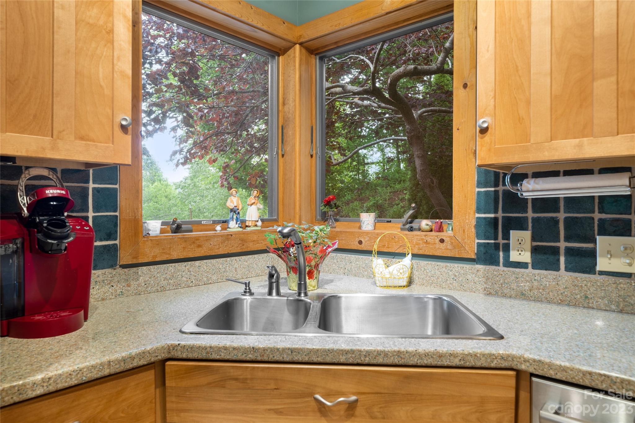 193 Eagle Ridge Clyde, NC 28721 - Photo 13 of 48 a kitchen sink with a granite countertop window and sink