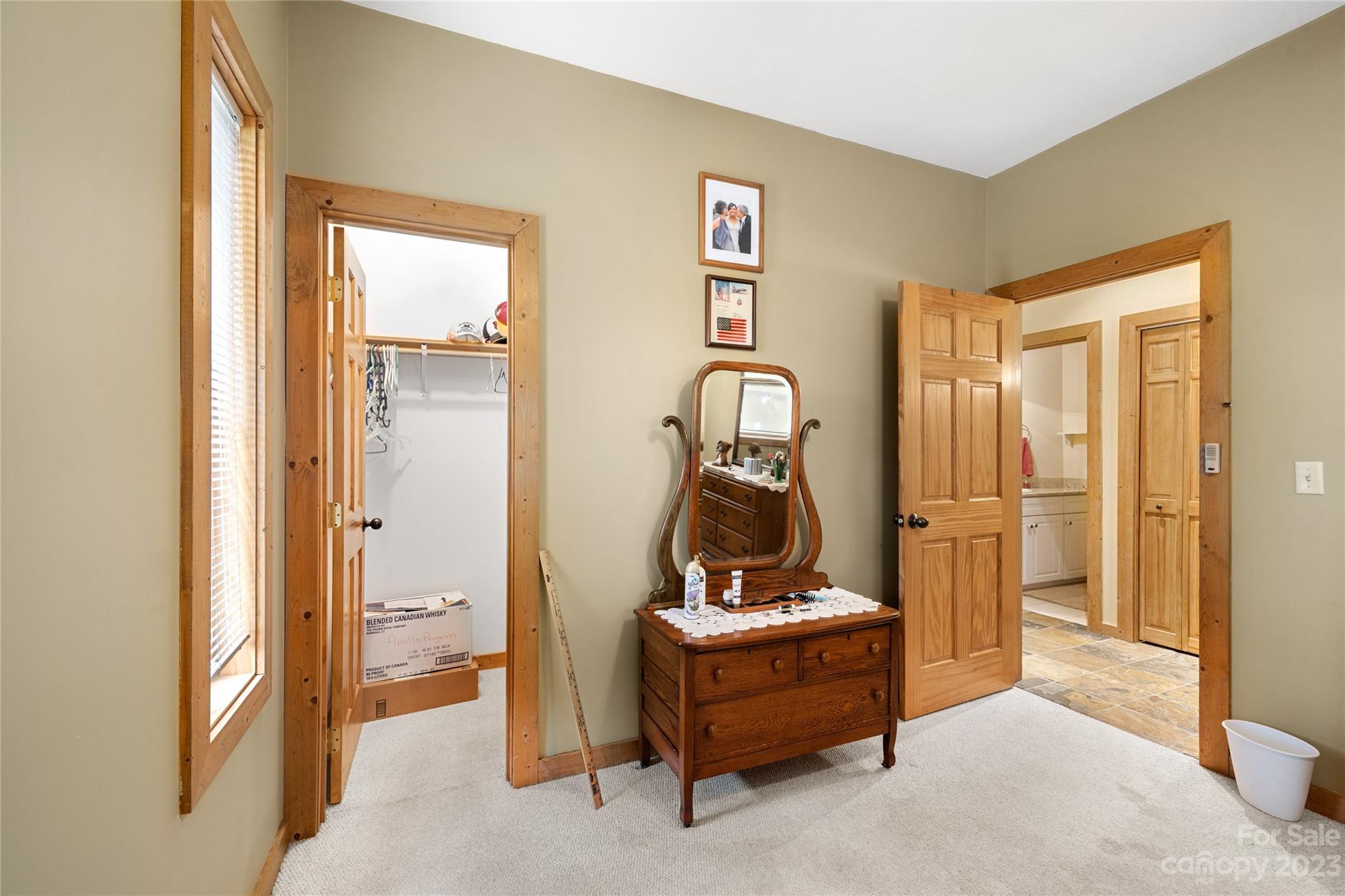 193 Eagle Ridge Clyde, NC 28721 - Photo 23 of 48 a room that has a bed and a mirror in it