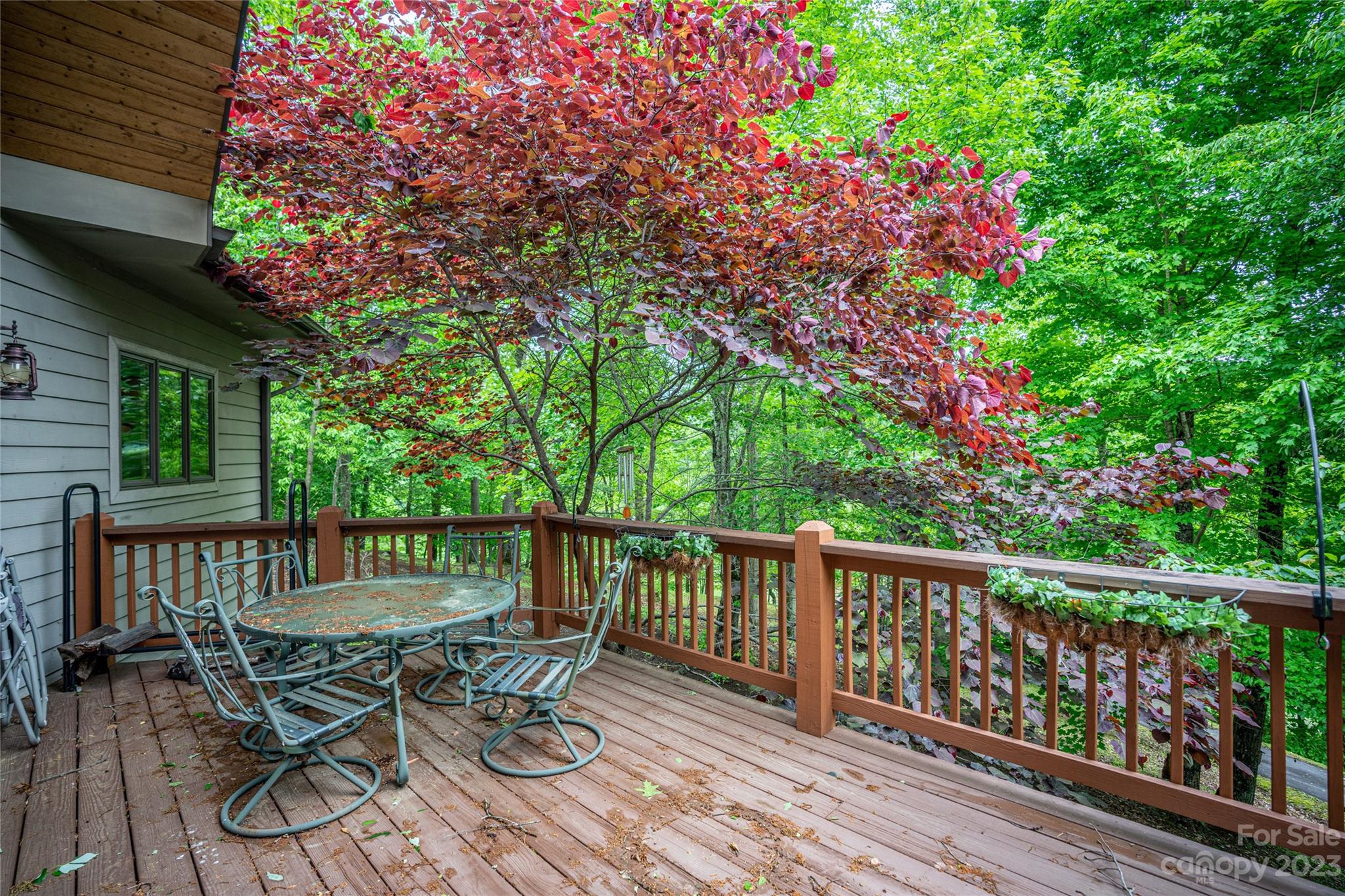 193 Eagle Ridge Clyde, NC 28721 - Photo 34 of 48 a view of a wooden deck with furniture
