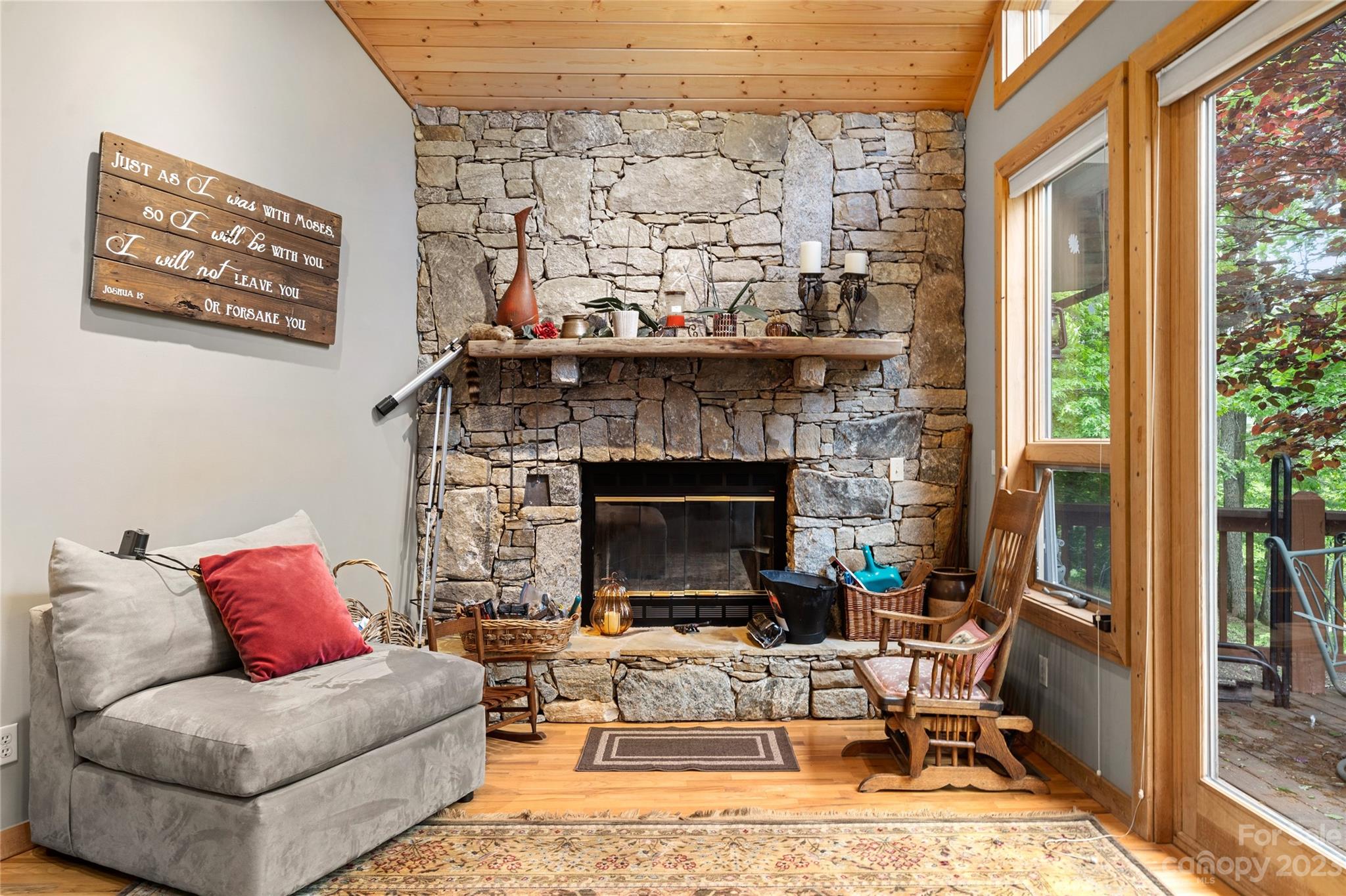 193 Eagle Ridge Clyde, NC 28721 - Photo 4 of 48 a living room with furniture and a fireplace