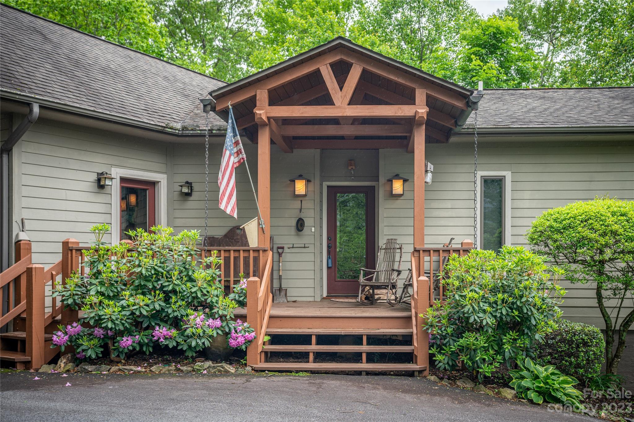 193 Eagle Ridge Clyde, NC 28721 - Photo 41 of 48 a front view of a house with a yard