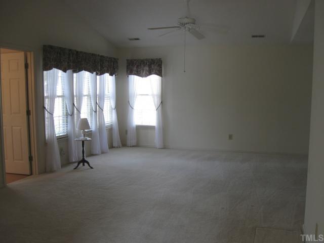 2701 Cottage Circle Raleigh, NC 27613 - Photo 3 of 10 a view of an empty room with a window