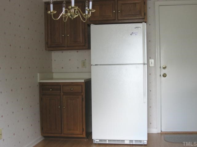 2701 Cottage Circle Raleigh, NC 27613 - Photo 7 of 10 a view of a kitchen with electric appliances