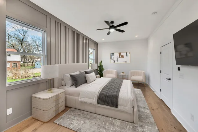 a bathroom with double vanity sinks and a mirror