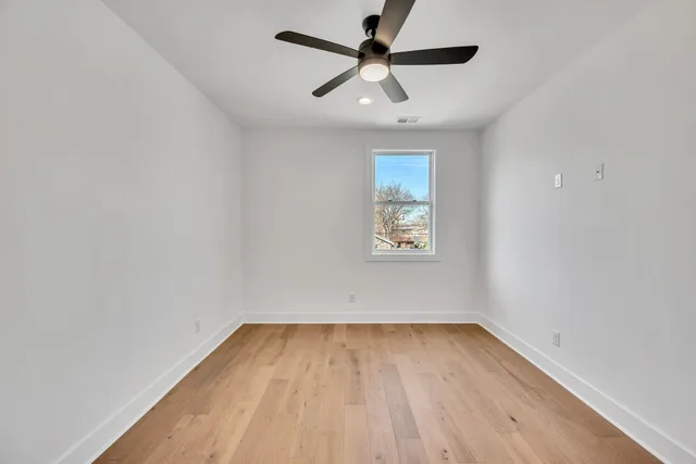 a bathroom with a tub and shower