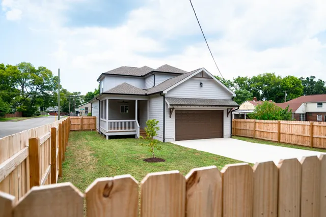 a front view of a house with yard