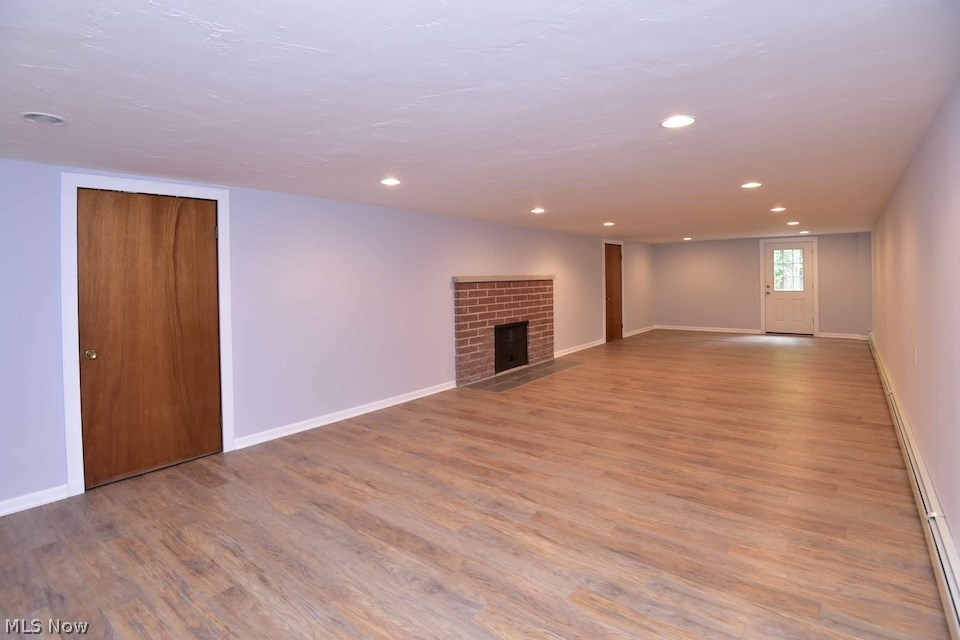 295 River Road Hinckley, OH 44233 - Photo 7 of 25 A wonderful finished space that walks out to the ground level and the adjoining extra parcel.
