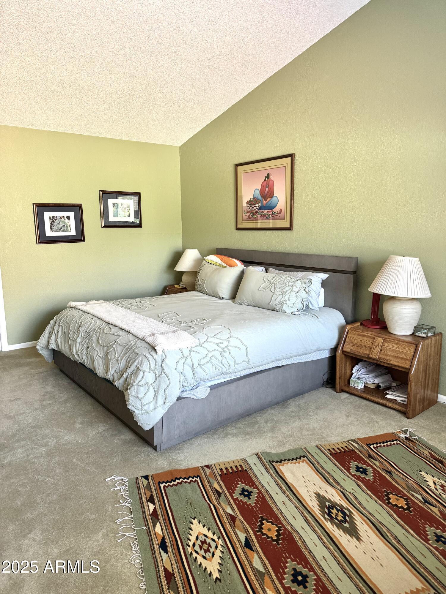 7432 Hum Road, Unit 203 Carefree, AZ 85377 - Photo 11 of 21 a bedroom with a bed and a lamp on dresser