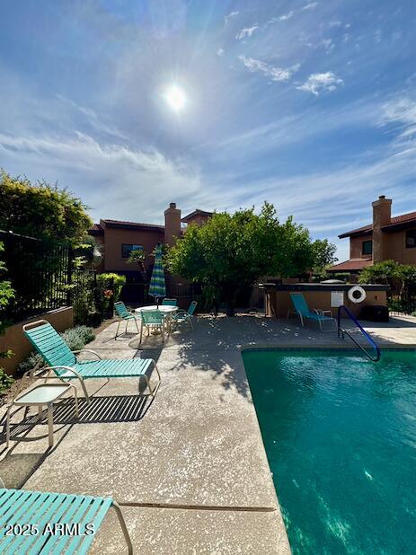7432 Hum Road, Unit 203 Carefree, AZ 85377 - Photo 18 of 21 a view of a backyard with sitting area