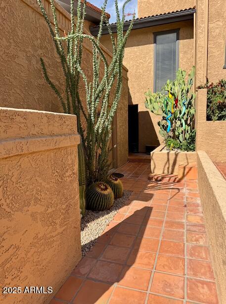7432 Hum Road, Unit 203 Carefree, AZ 85377 - Photo 21 of 21 a white bench sitting in front of a house