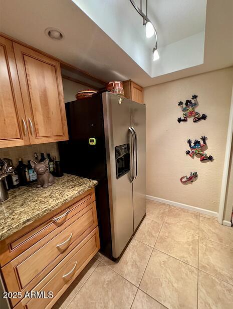 7432 Hum Road, Unit 203 Carefree, AZ 85377 - Photo 4 of 21 a kitchen with a refrigerator and window