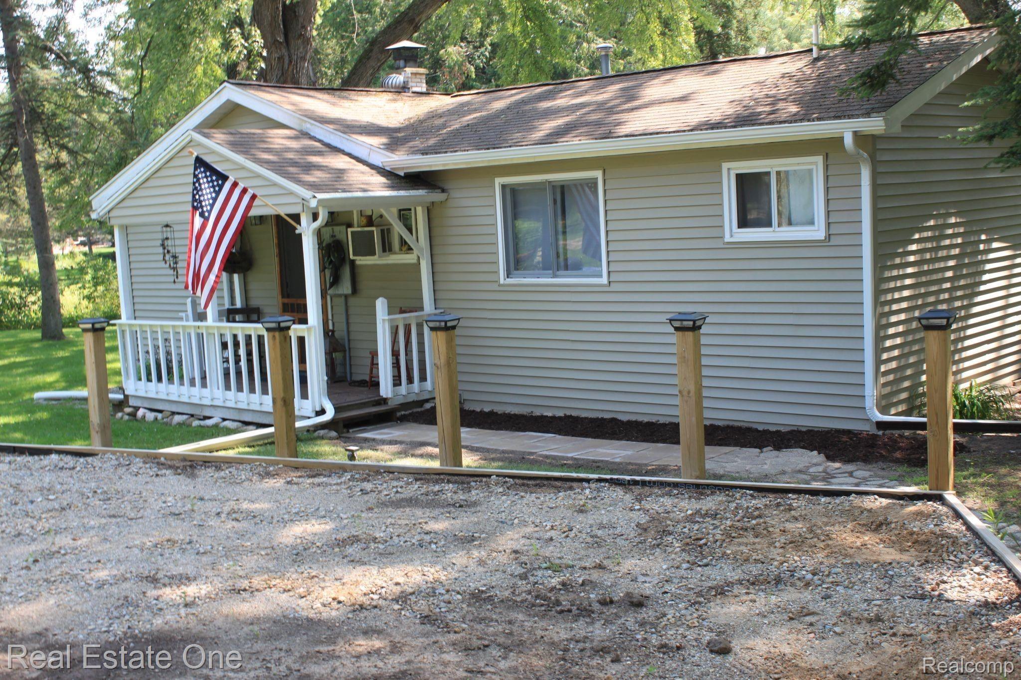5475 North Cedar River Road Gladwin, MI 48624 - Photo 2 of 64 front of home.JPG
