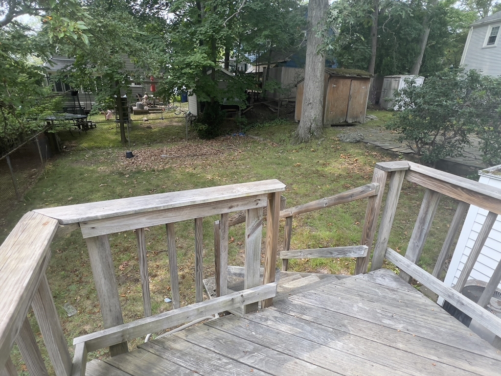 223 Woodcliff Road Newton, MA 02461 - Photo 14 of 15 a view of a small yard from a balcony