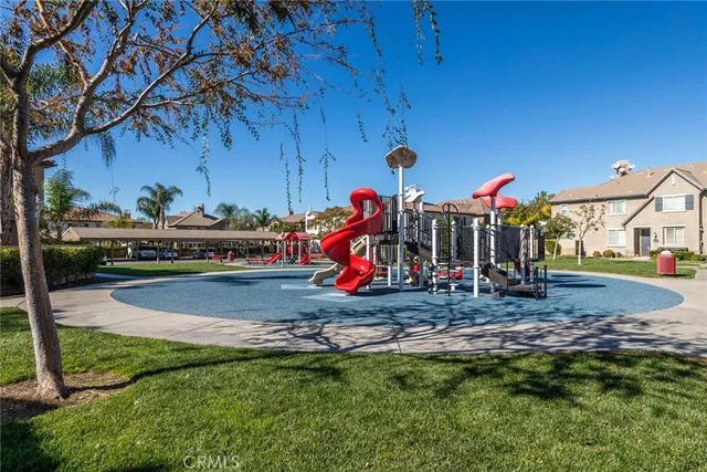 a view of a backyard with potted plants