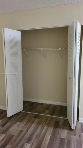 a view of room with walk in closet