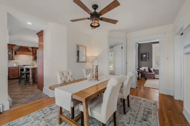 a view of a dining room with furniture