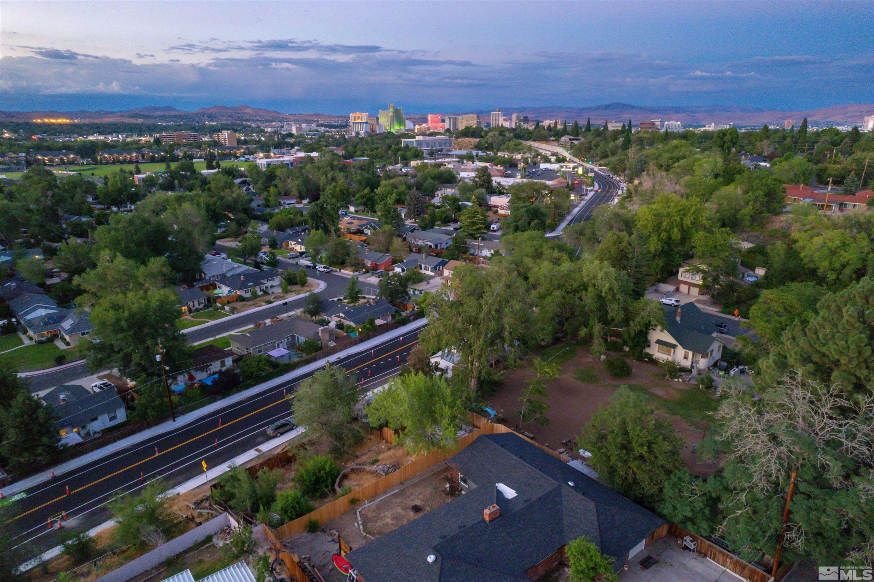 California Ave Reno, NV 89509 - Photo 3 of 8 an aerial view of residential house with outdoor space and trees all around