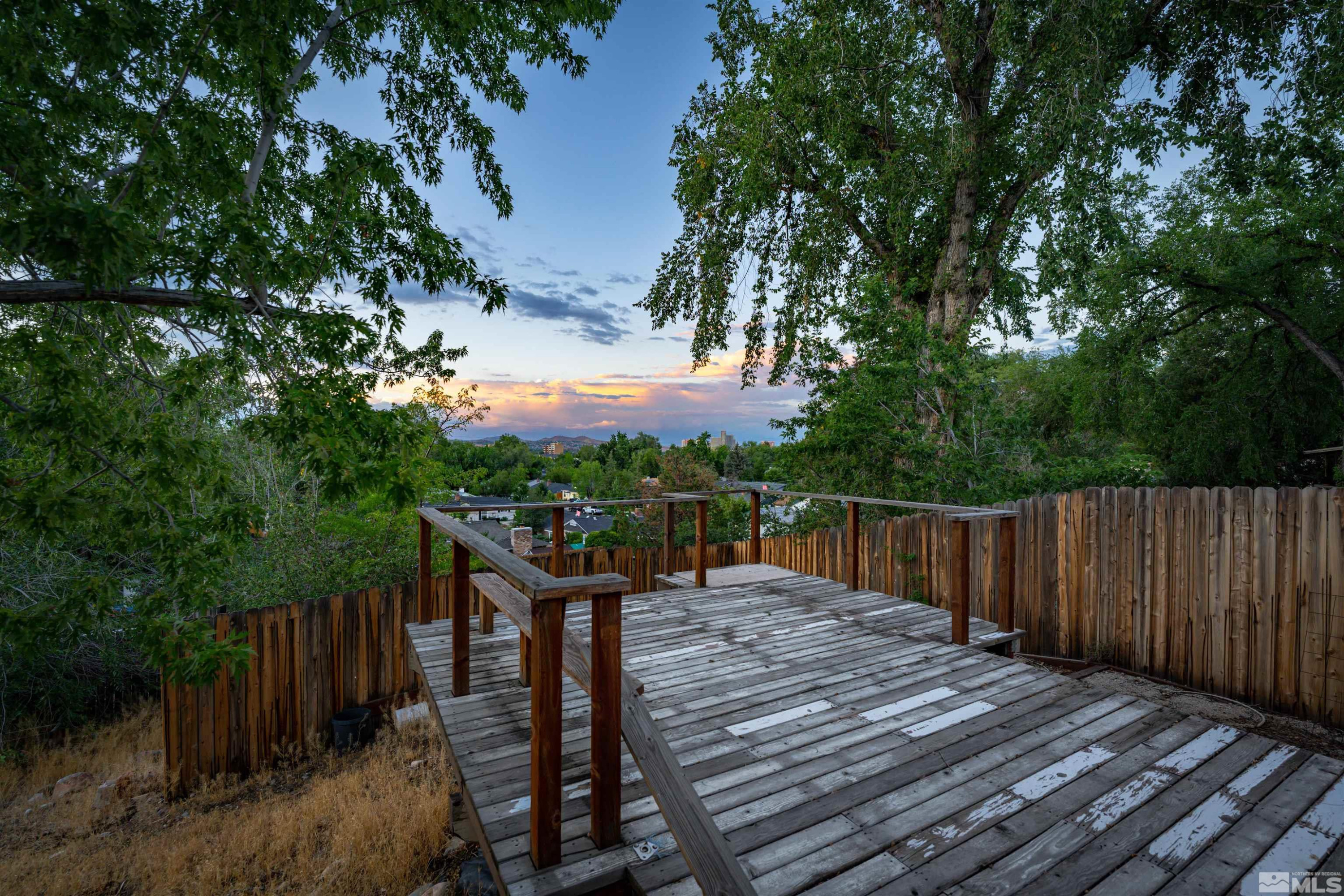 California Ave Reno, NV 89509 - Photo 5 of 8 a view of deck with wooden floor and fence