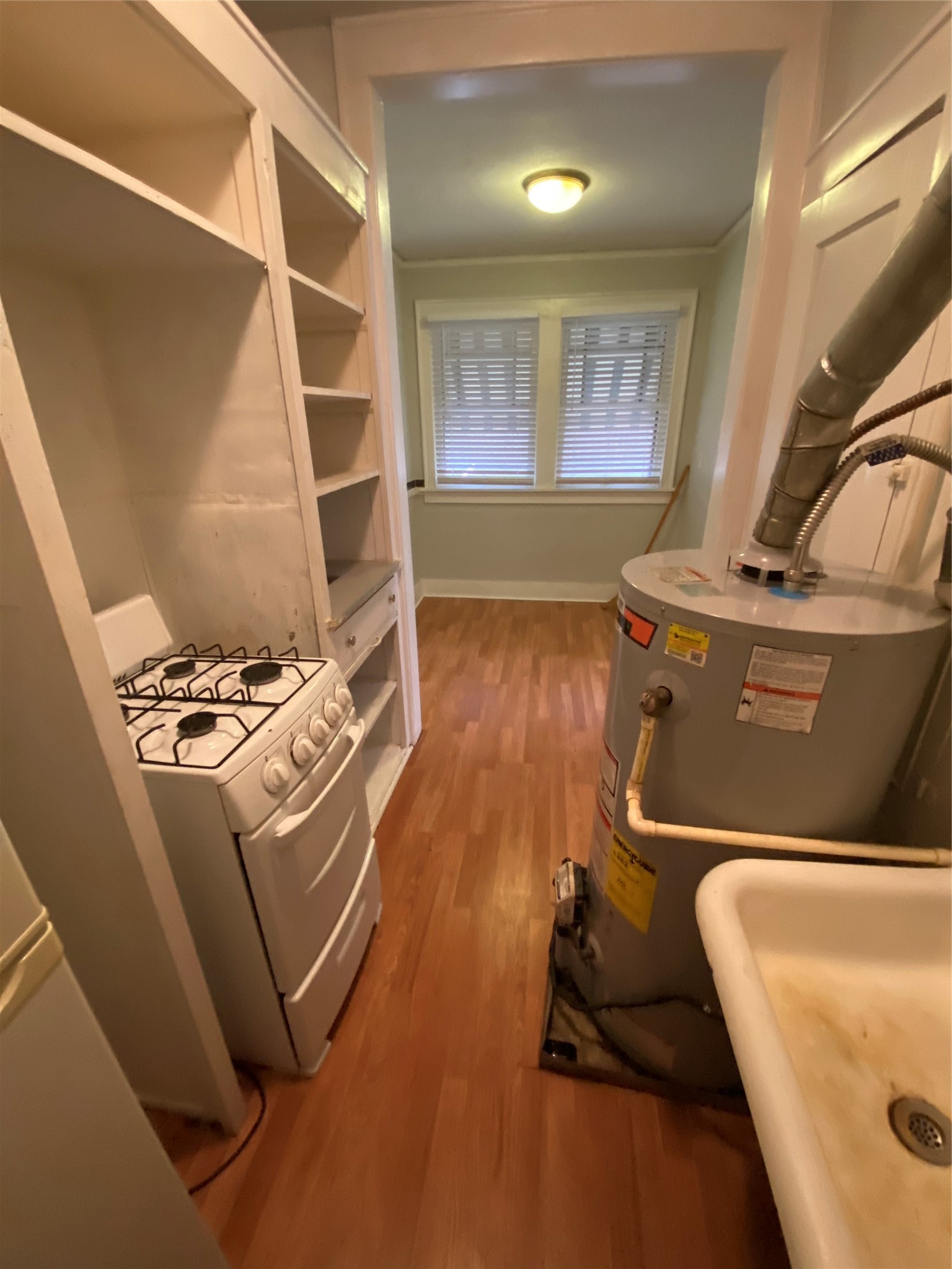 1414 Austin Street, Unit 6 Houston, TX 77002 - Photo 8 of 9 a room with storage and utility