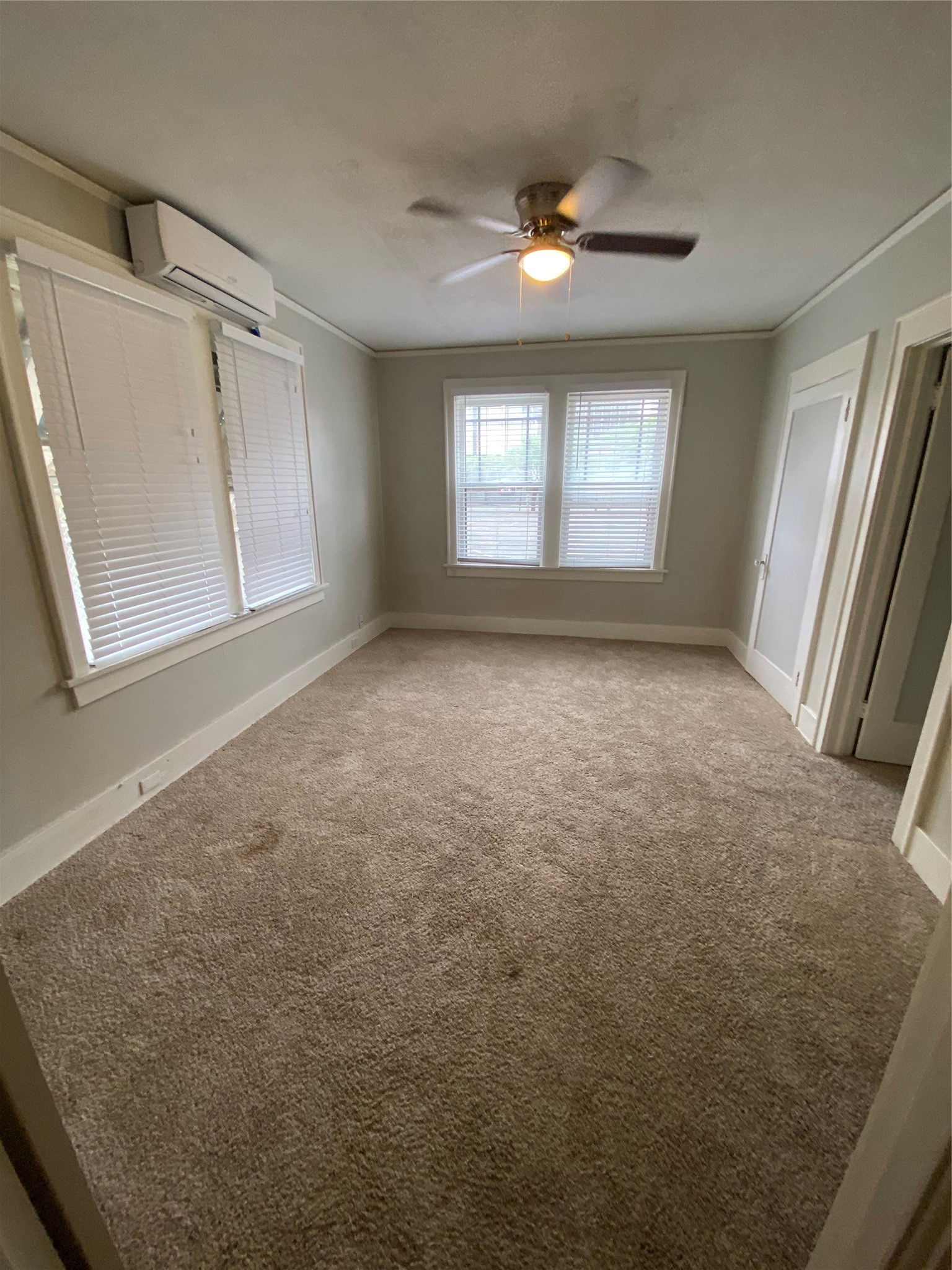 1414 Austin Street, Unit 6 Houston, TX 77002 - Photo 9 of 9 a view of an empty room with a window