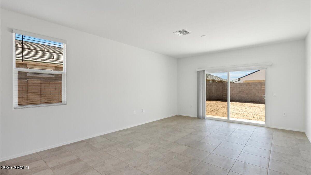 2032 Starkey Avenue Apache Junction, AZ 85120 - Photo 8 of 16 a view of an empty room with a window