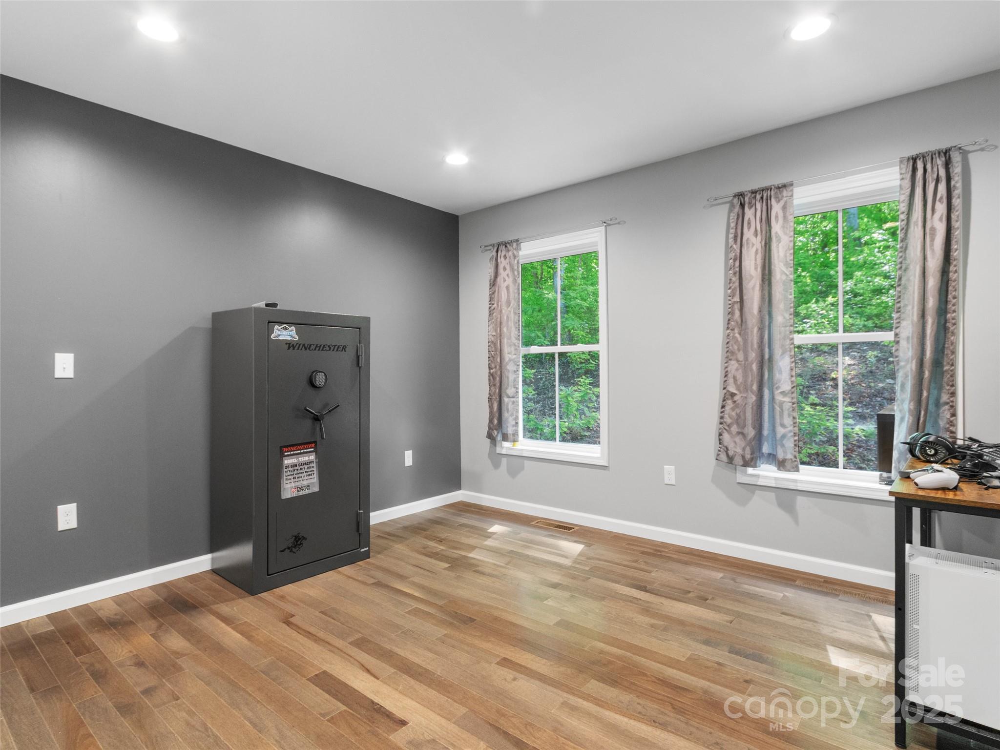 155 Pebble Ridge Road Spruce Pine, NC 28777 - Photo 24 of 39 a view of an empty room with a window