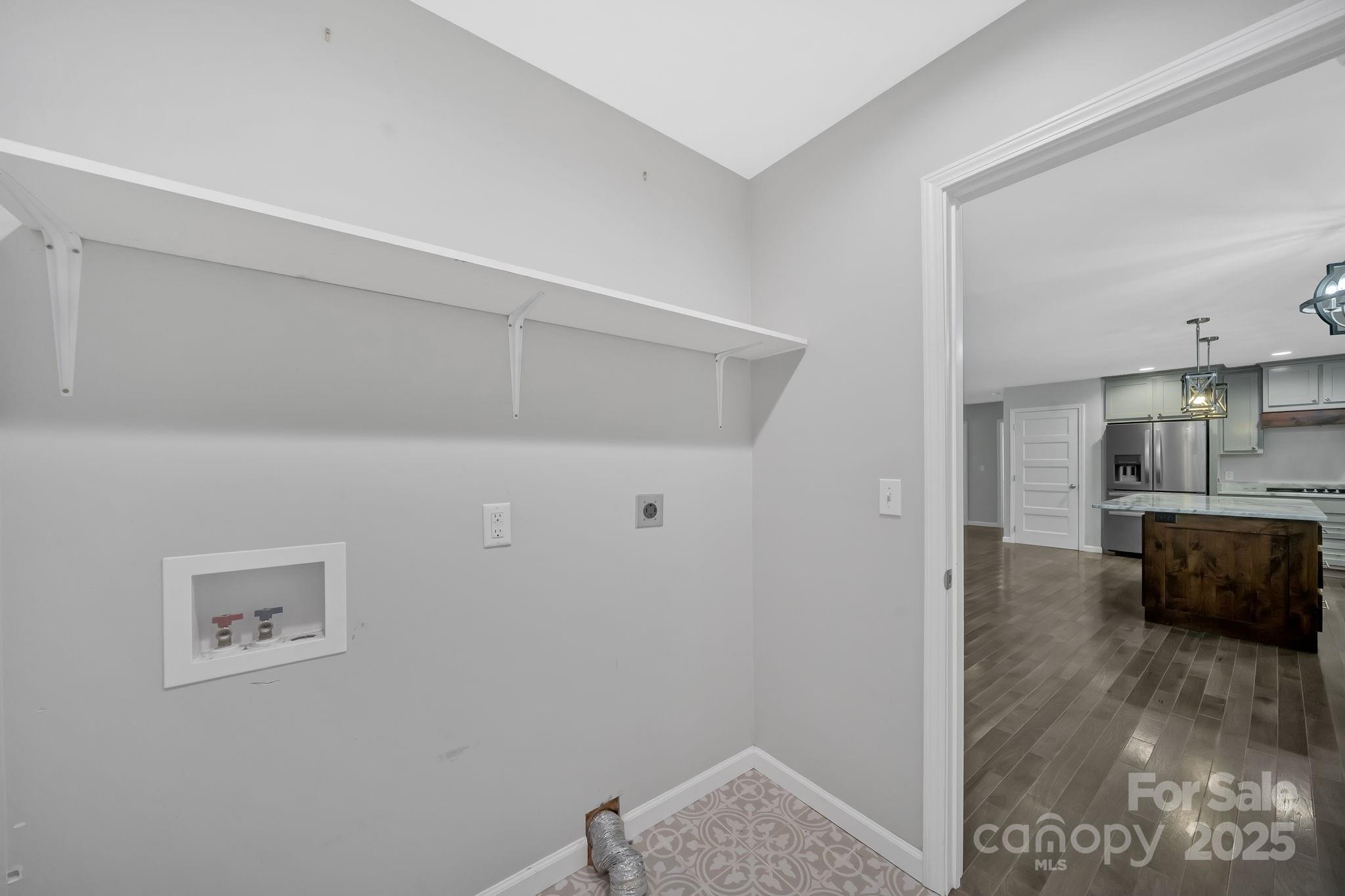 155 Pebble Ridge Road Spruce Pine, NC 28777 - Photo 29 of 39 a view of kitchen and hall with wooden floor