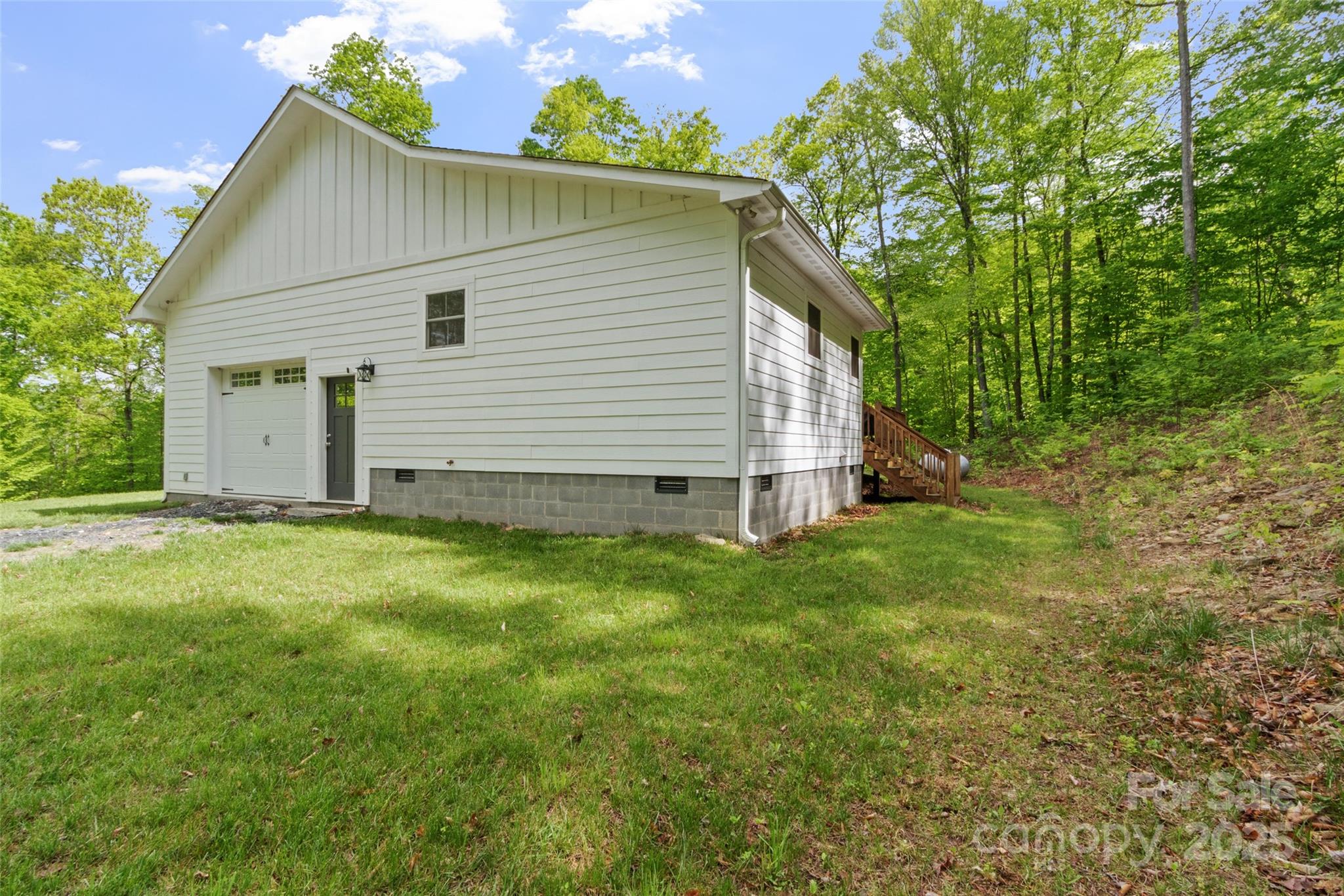 155 Pebble Ridge Road Spruce Pine, NC 28777 - Photo 33 of 39 a view of a house with backyard