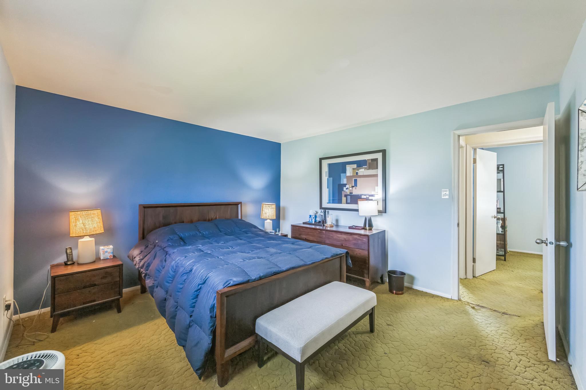 150 Red Stone Ridge Delran, NJ 08075 - Photo 21 of 28 a bedroom with a bed and a lamp on dresser