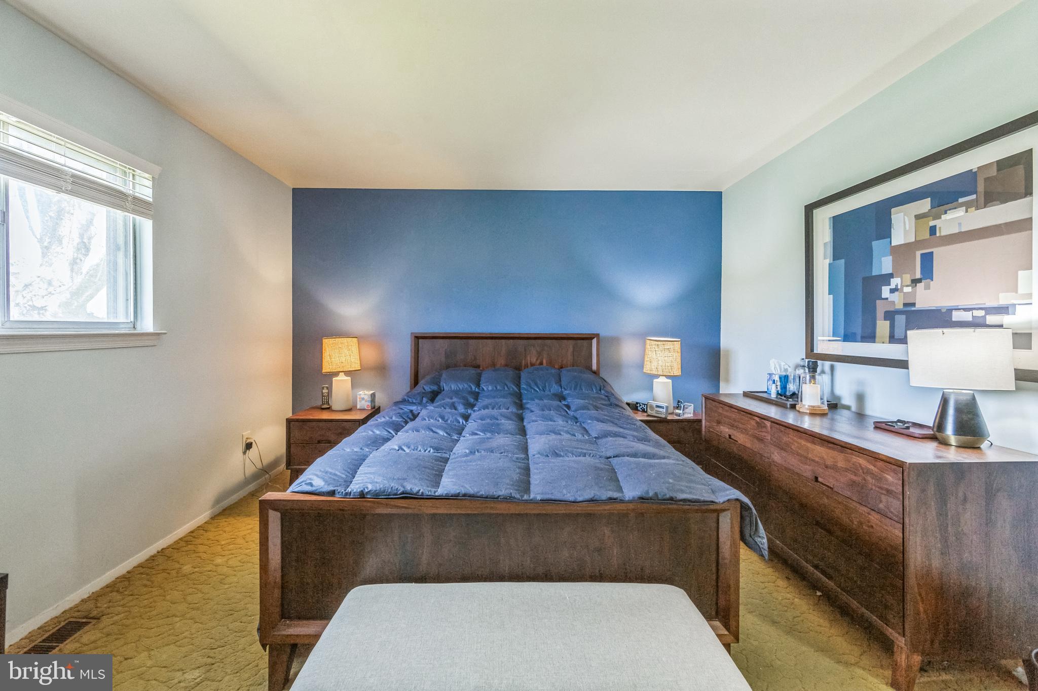 150 Red Stone Ridge Delran, NJ 08075 - Photo 22 of 28 a bed sitting in a bedroom next to a window