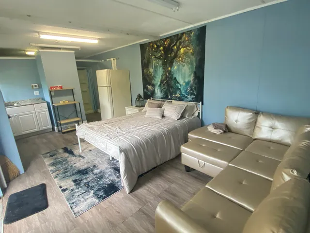 a living room with a couch and a table