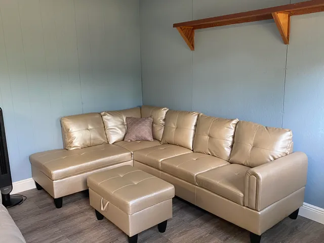 a bedroom with a bed and a cabinets